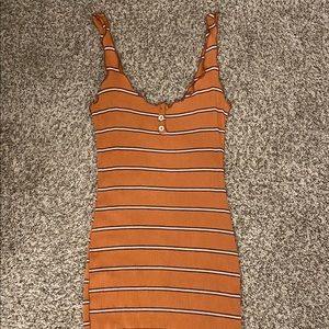 Tank dress with shoulder and bottom helm ruffle detail